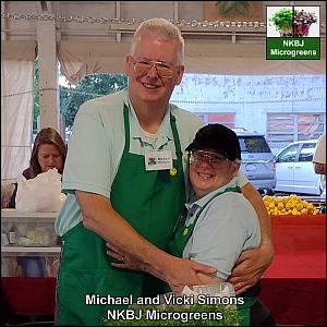 Michael and Vicki Simons at the NKBJ Microgreens table at the Aiken County Farmers Market.