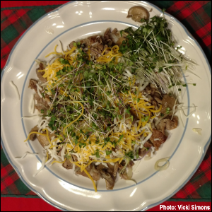 Shaved beef with onions and mushrooms, topped with cheeses and mixed microgreens. Photo by Vicki Simons.